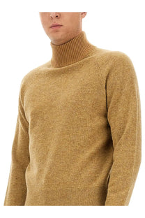 A warm heathered mustard yellow turtleneck sweater with ribbed collar and cuffs in dries van noten men’s mutated shirt beige