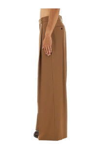 Tan wide-leg trousers with tailored fit and subtle front pleats from dries van noten men’s pants beige collection