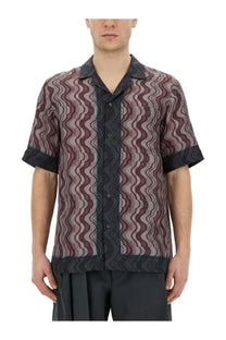 Dries Van Noten men’s short-sleeved button-up shirt with bold maroon and gray wavy pattern and black trim