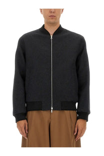 Dries Van Noten men’s black wool bomber jacket with ribbed cuffs and waistband and silver front zipper