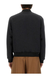 Dries Van Noten men’s reversible black wool bomber jacket with ribbed cuffs and collar for versatile wear
