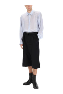 Light blue semi-sheer Dries Van Noten men’s button-down shirt with subtle vertical stripes in lightweight fabric