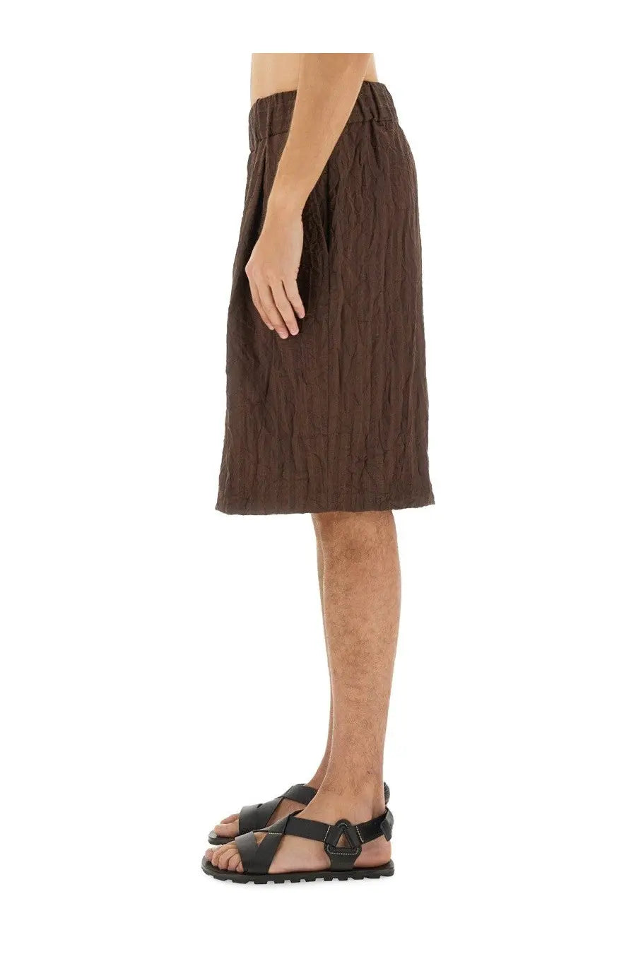 Brown textured linen skirt with relaxed mid-thigh length cut from dries van noten men’s short pleated brown collection