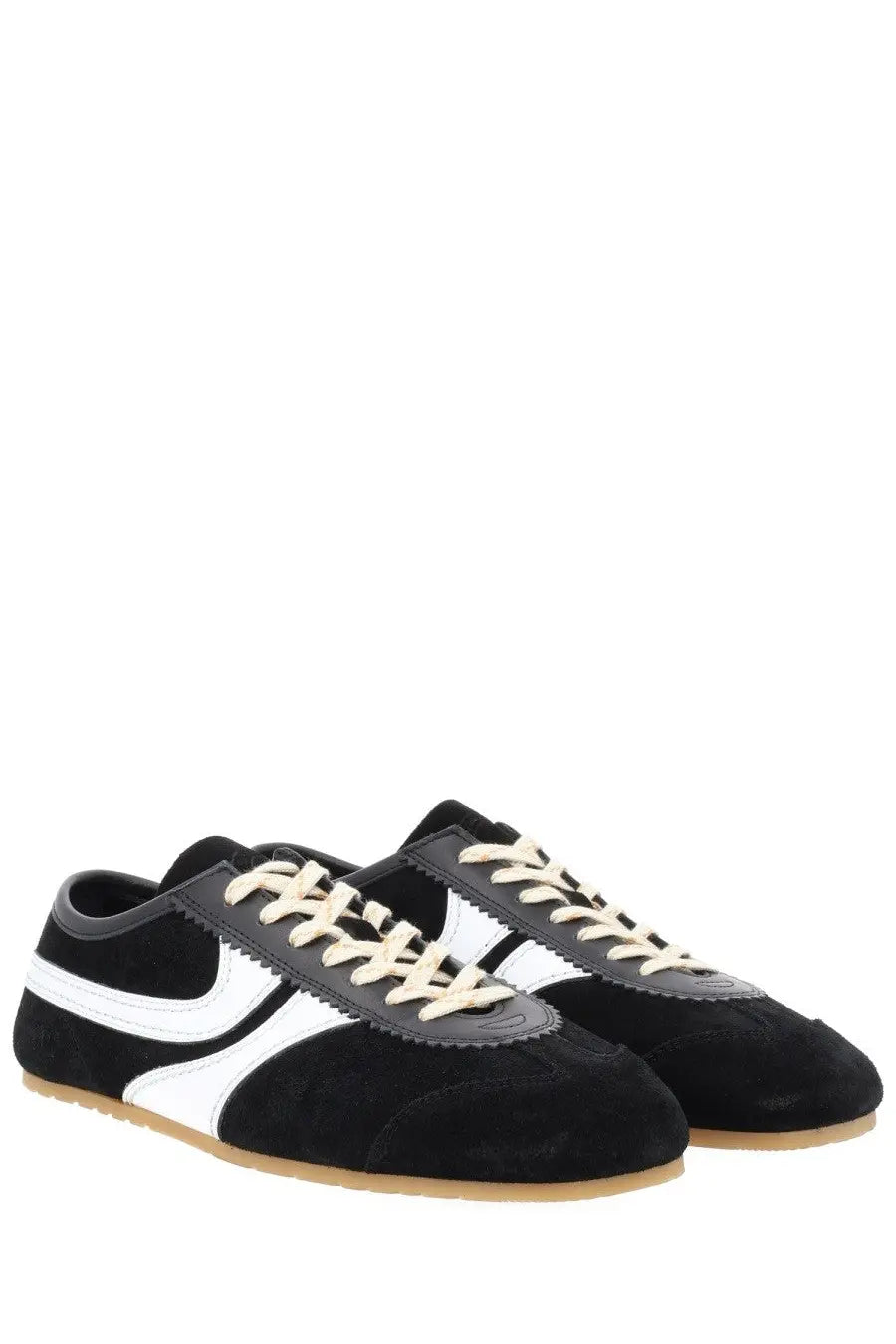 Dries Van Noten men’s suede sneaker in black and white with cream-colored laces and a sleek design