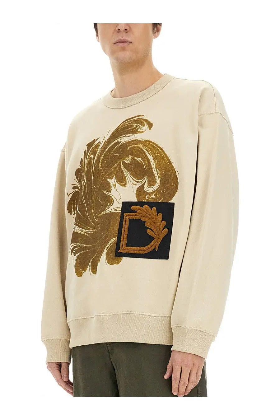 Dries van noten men’s beige cream sweatshirt with gold leaf swirl graphic and embroidered black patch d logo