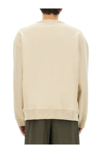 Dries Van Noten men’s beige oversized sweatshirt with relaxed fit and ribbed cuffs in soft fabric