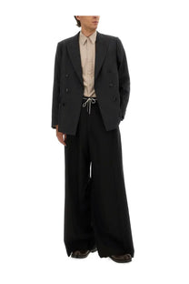 Dries van noten men’s wool jacket grey featuring a black double-breasted blazer with white contrasting buttons