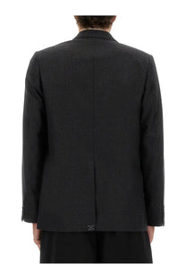 Black textured blazer with subtle sheen and structured shoulders from dries van noten men’s wool jacket grey collection
