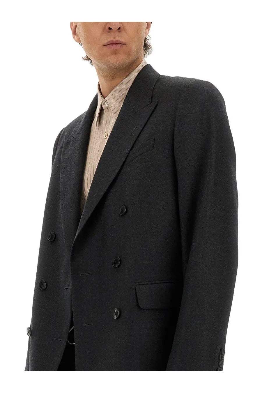 Dark gray double-breasted wool suit jacket with black buttons and subtle woven texture from Dries Van Noten