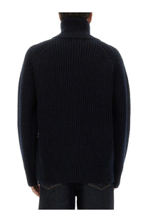 Dark navy ribbed knit turtleneck sweater with textured structured shoulders by dries van noten in wool with zipper
