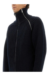 Dries Van Noten men’s dark navy ribbed wool zip-up sweater with high collar and silver zipper
