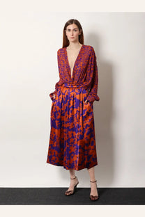 Dries Van Noten women’s camiel cotton shirt in vibrant orange with purple floral print and long sleeves