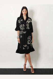Dries Van Noten women’s Casia shirt dress in black with white embroidered floral patterns and ruffled hem