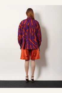 Dries Van Noten women’s Catya cotton shirt orange vibrant purple and orange patterned blouse with ruffled neckline and long sleeves
