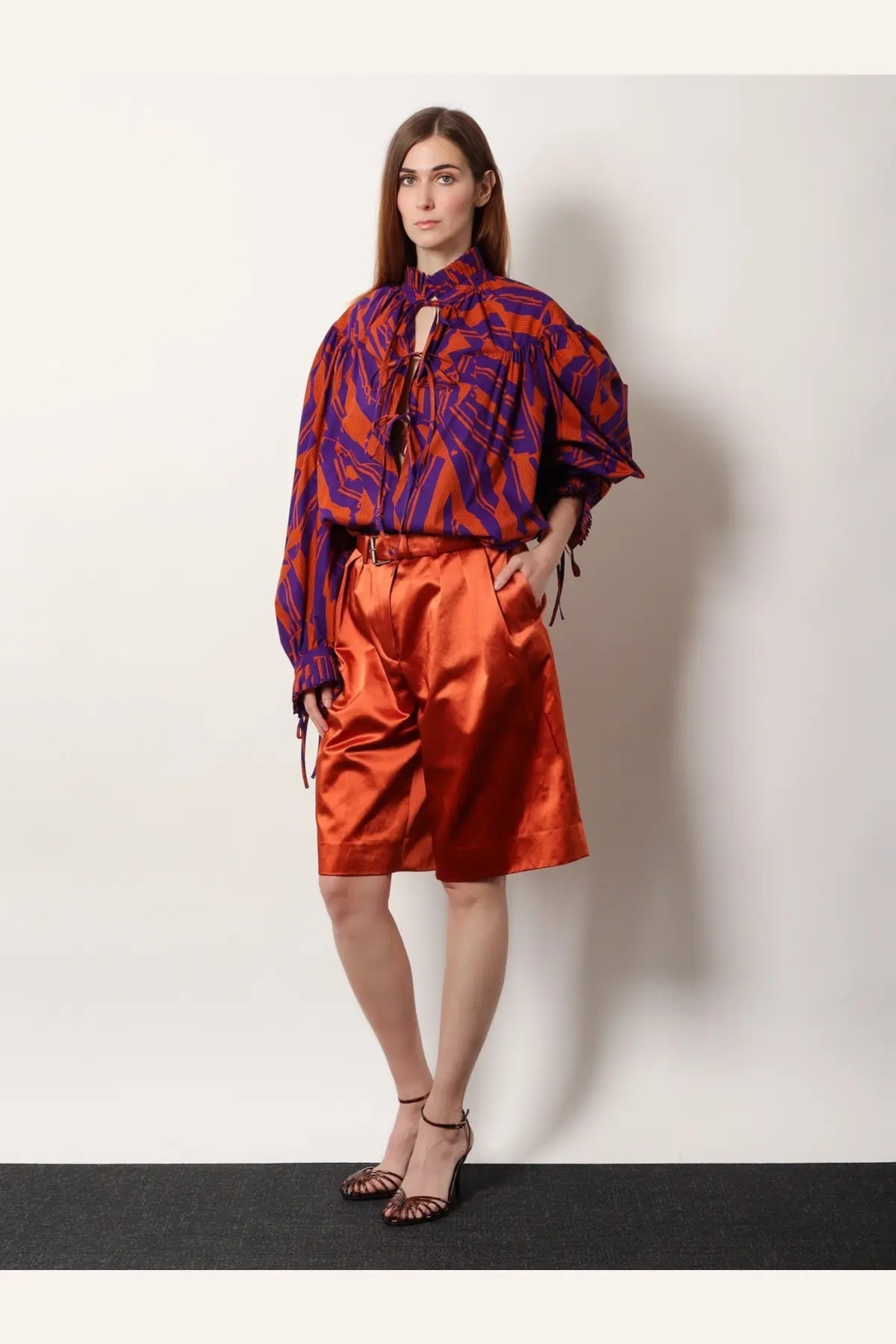 Dries Van Noten women’s cotton blend bermuda shorts in vibrant orange satin with high waist and subtle pleats