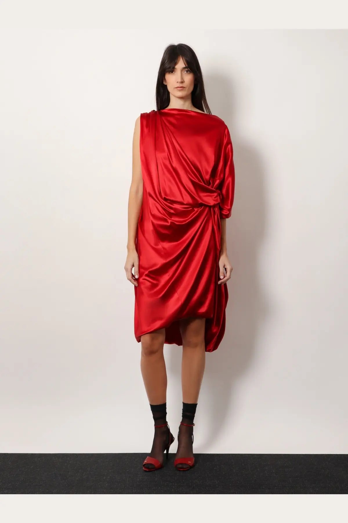 A vibrant red satin one-shoulder draped dress made of silk from dries van noten womens dalant collection