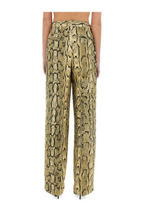 Dries Van Noten women’s jacquard wide-leg pants with gold and black snake-skin pattern and luxurious texture