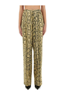 High-waisted dries van noten jacquard pants with bold textured olive green and black snake print pattern