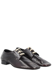 Dries Van Noten women’s leather loafer in brown with black patent leather dress shoes featuring perforated detailing and cream laces