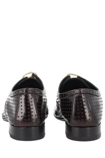 Dries Van Noten women’s dark brown leather brogue dress shoes with perforated detailing and black rubber soles