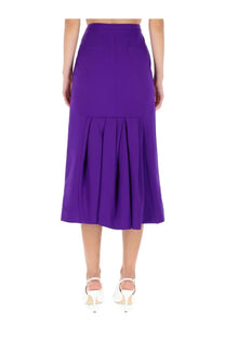 Dries Van Noten women’s purple midi skirt with high waist pleated hemline and two back pockets shown from the back
