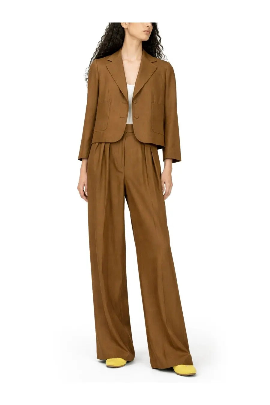 A sleek camel-colored wool-blend blazer with tailored fit and notched lapels from dries van noten pantalone sartoriale con cintura brown