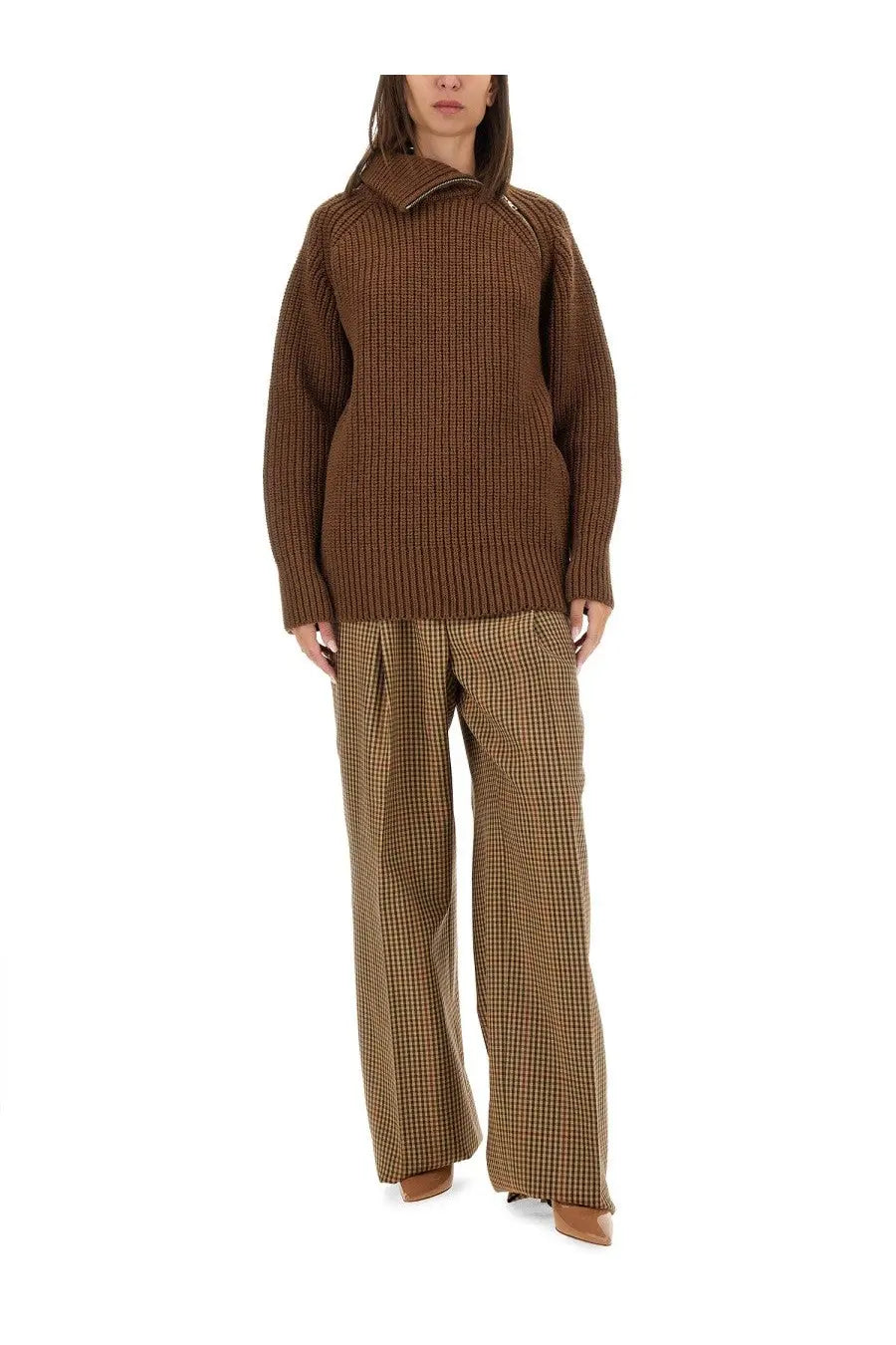 Brown ribbed knit sweater with high collar and long sleeves paired with dries van noten women’s brown pants