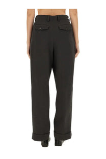 Dries van noten women’s black high-waisted tailored trousers with front pockets and rolled cuffs