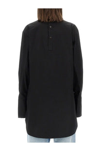 Back view of dries van noten womens black long-sleeved blouse with buttoned back and relaxed fit