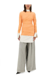 Dries Van Noten women’s orange ribbed long-sleeve top with white checkered cuffs and high collar