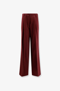 Dries Van Noten women’s portias wool trousers in red feature high-waisted wide-leg tailored pleated design