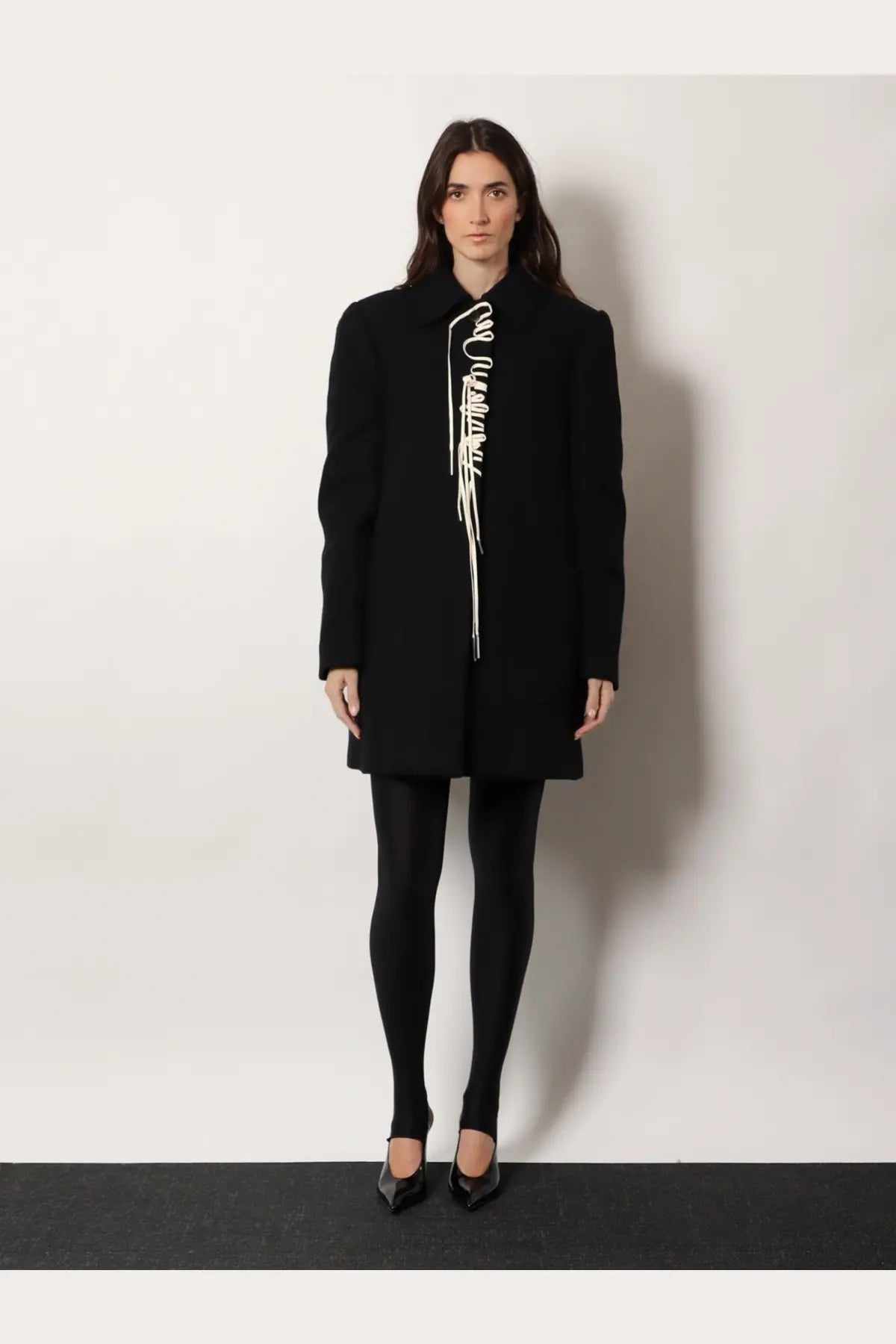 Dries Van Noten women’s black wool blend coat with distinctive white twisted cord detail down the front