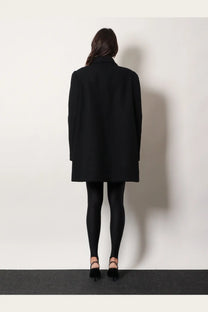 Black wool blend coat by dries van noten featuring structured shoulders and classic collar for women