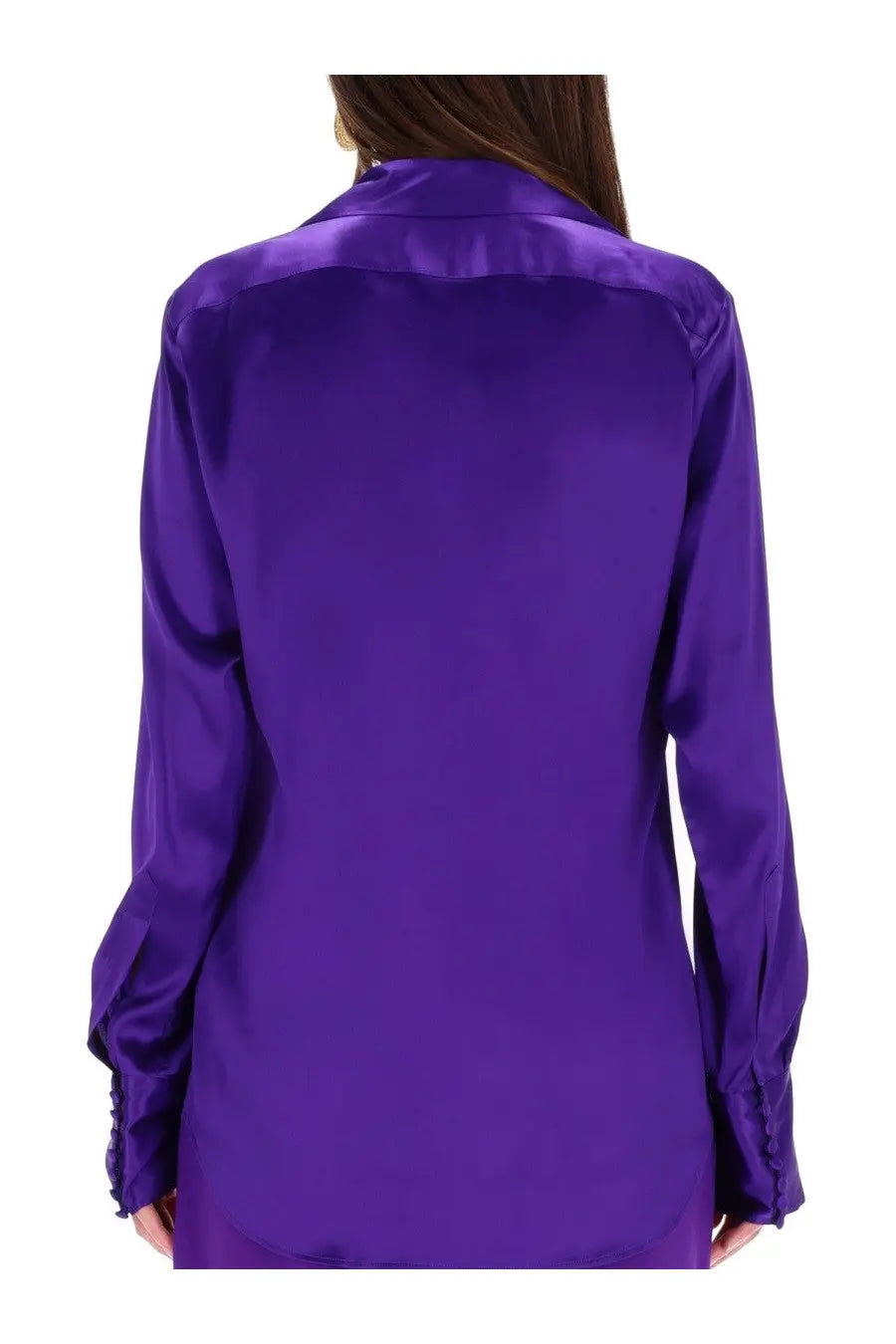 A vibrant purple silk blouse by Dries Van Noten featuring a glossy satin finish and subtle ruching at the cuffs