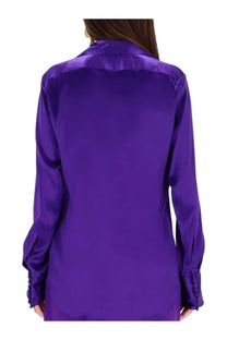 A vibrant purple silk blouse by Dries Van Noten featuring a glossy satin finish and subtle ruching at the cuffs