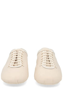 Cream-colored leather dries van noten women’s sneaker ballerina with matching laces minimalist low-profile design