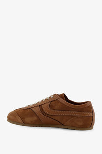 Dries Van Noten women’s beige suede sneakers with white laces and a classic retro-inspired design
