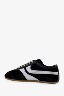 Dries Van Noten women’s black suede sneakers with bold white swoosh and beige laces