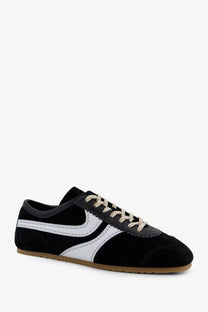 Dries Van Noten women’s black suede sneakers with white stripe detailing and beige laces