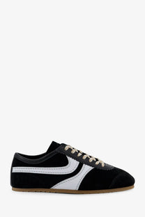 Dries Van Noten women’s suede sneakers in black with white leather accents and classic retro design