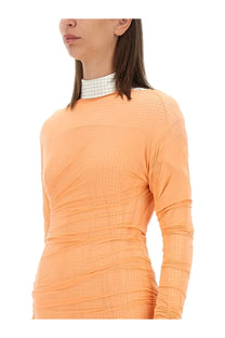 Dries Van Noten women’s fitted orange long-sleeved dress with textured ruched fabric and white grid high neckline