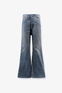 High waisted flared denim jeans in faded medium blue wash with subtle whiskering and distressing details by drkshdw men
