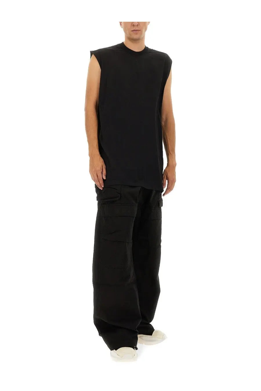 Black sleeveless t-shirt with relaxed oversized fit and ribbed neckline paired with drkshdw men’s cargo pants stefan black