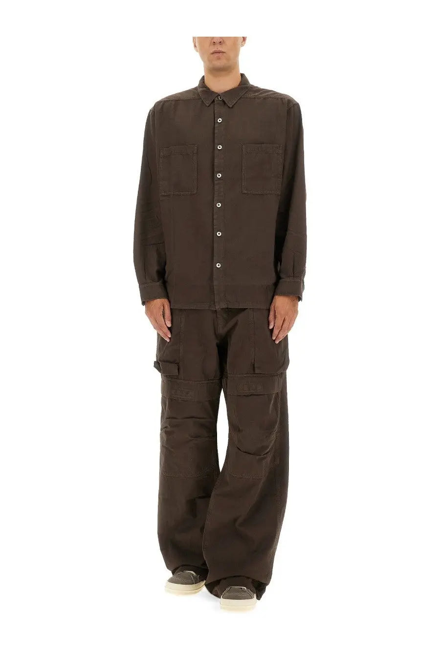 A dark brown long-sleeved button-up shirt with chest pockets and a classic collar paired with drkshdw men’s cargo pants