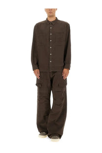 A dark brown long-sleeved button-up shirt with chest pockets and a classic collar paired with drkshdw men’s cargo pants