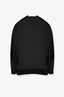 Black bomber jacket with sleek minimalist design made from recycled nylon in drkshdw mens convertible jumbo peter flight style