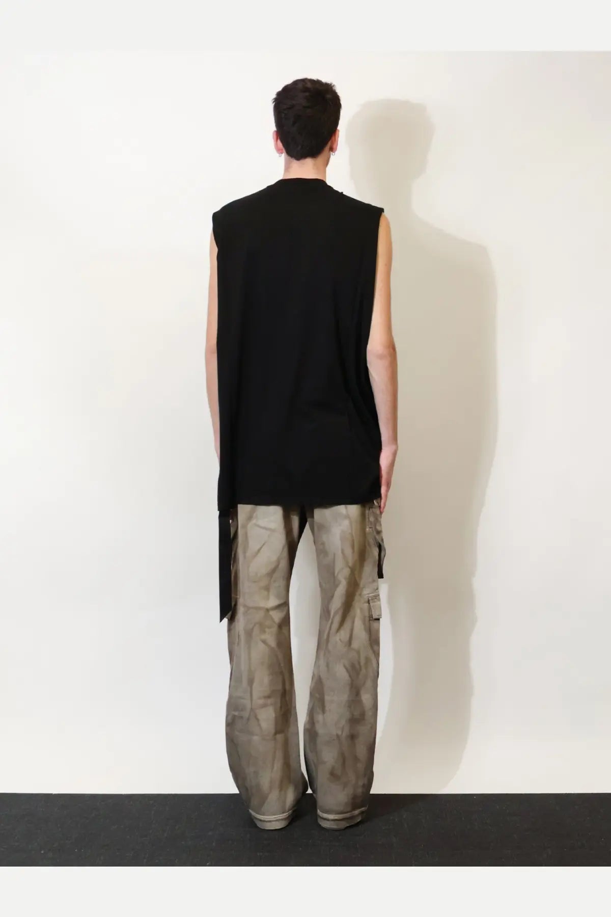 Drkshdw men’s black cotton tank top with sleeveless design and relaxed asymmetrical hemline