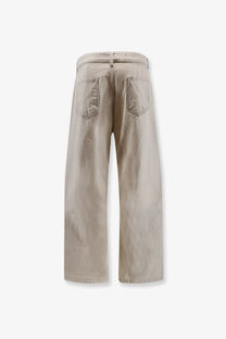 Beige wide-leg denim trousers with relaxed fit and classic back pockets shown from the back in drkshdw men’s denim jeans white