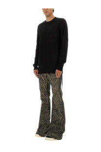 Black long-sleeved crewneck sweater with ribbed cuffs and hem paired with drkshdw men’s black denim pants