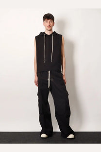 Black sleeveless hoodie with white drawstrings paired with drkshdw men’s double cargo jumbo belas trousers black
